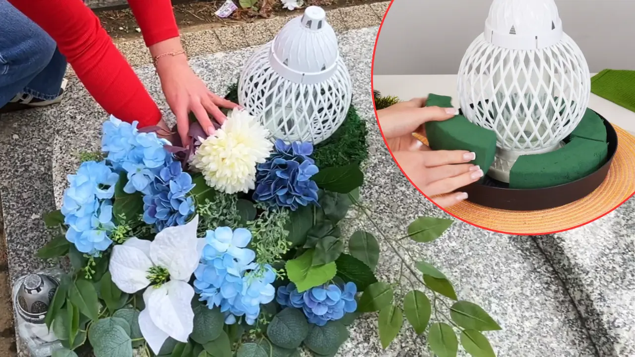 Wiązanka na grobie z białym zniczem i niebieskimi sztucznymi kwiatami i mocowanie gąbki florystycznej przy zniczu do wiązanki
